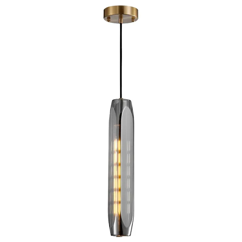 Slim crystal and brass pendant light, faceted glass tube on white background