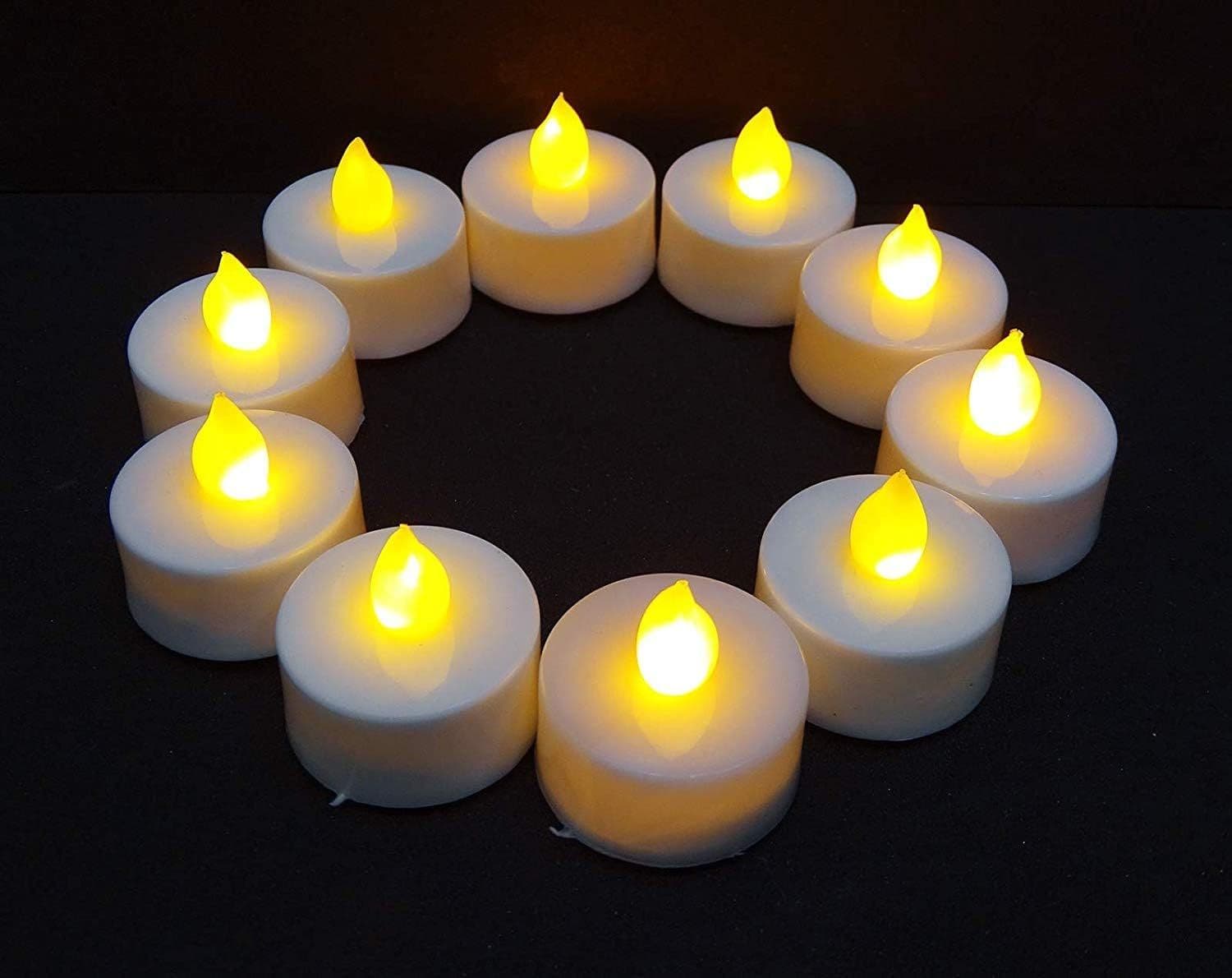 Flameless LED tealights arranged in a circle, lit warm yellow