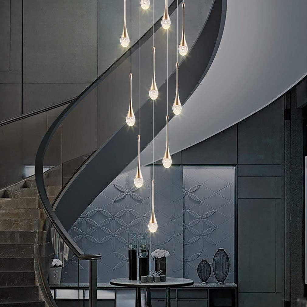 Crystal ball chandelier installed above a staircase, drops following the stairs