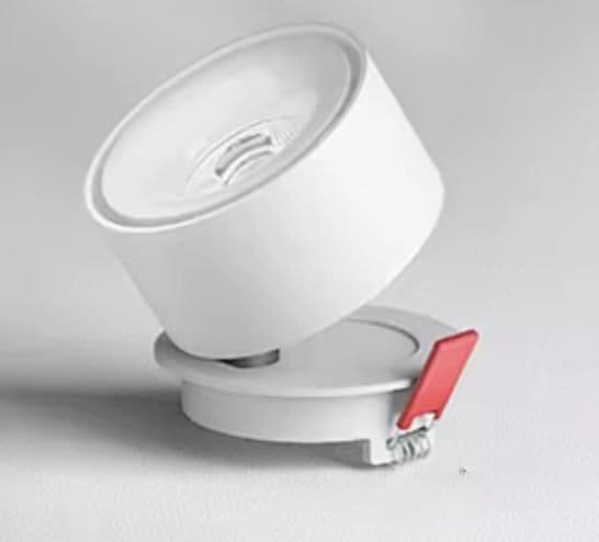 White round surface-mounted spotlight with tilting head