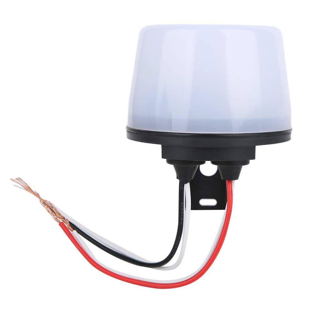 20 amp automatic photocell sensor switch with wire leads on plain background