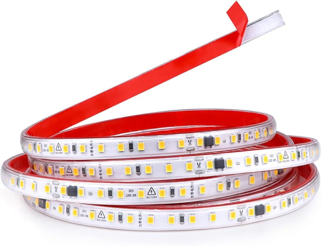 Red LED strip light coiled on white background
