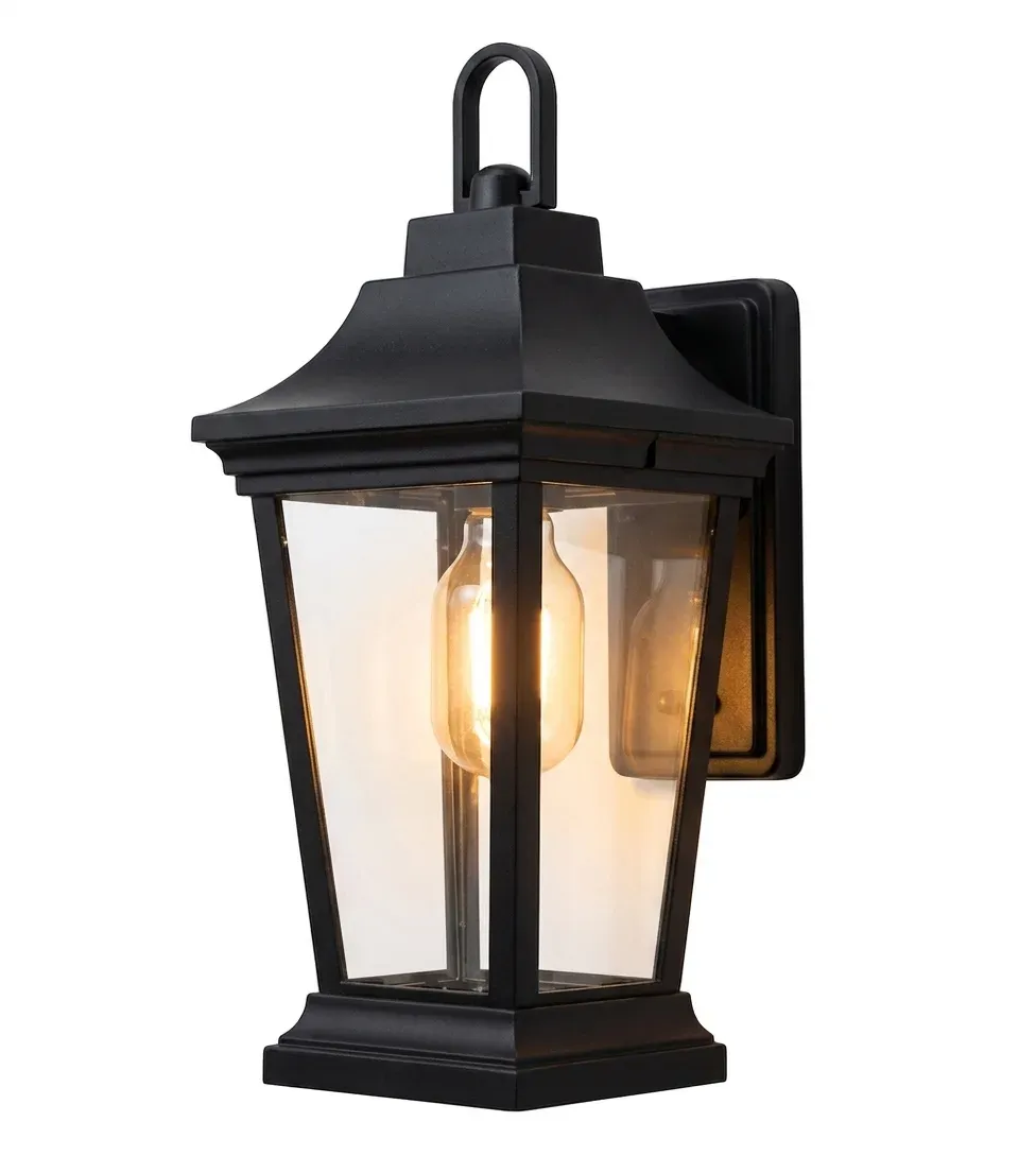 Outdoor wall lamp with clear glass panels, lit, on plain background